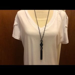 black chain with dark blue faceted beads and black tassel